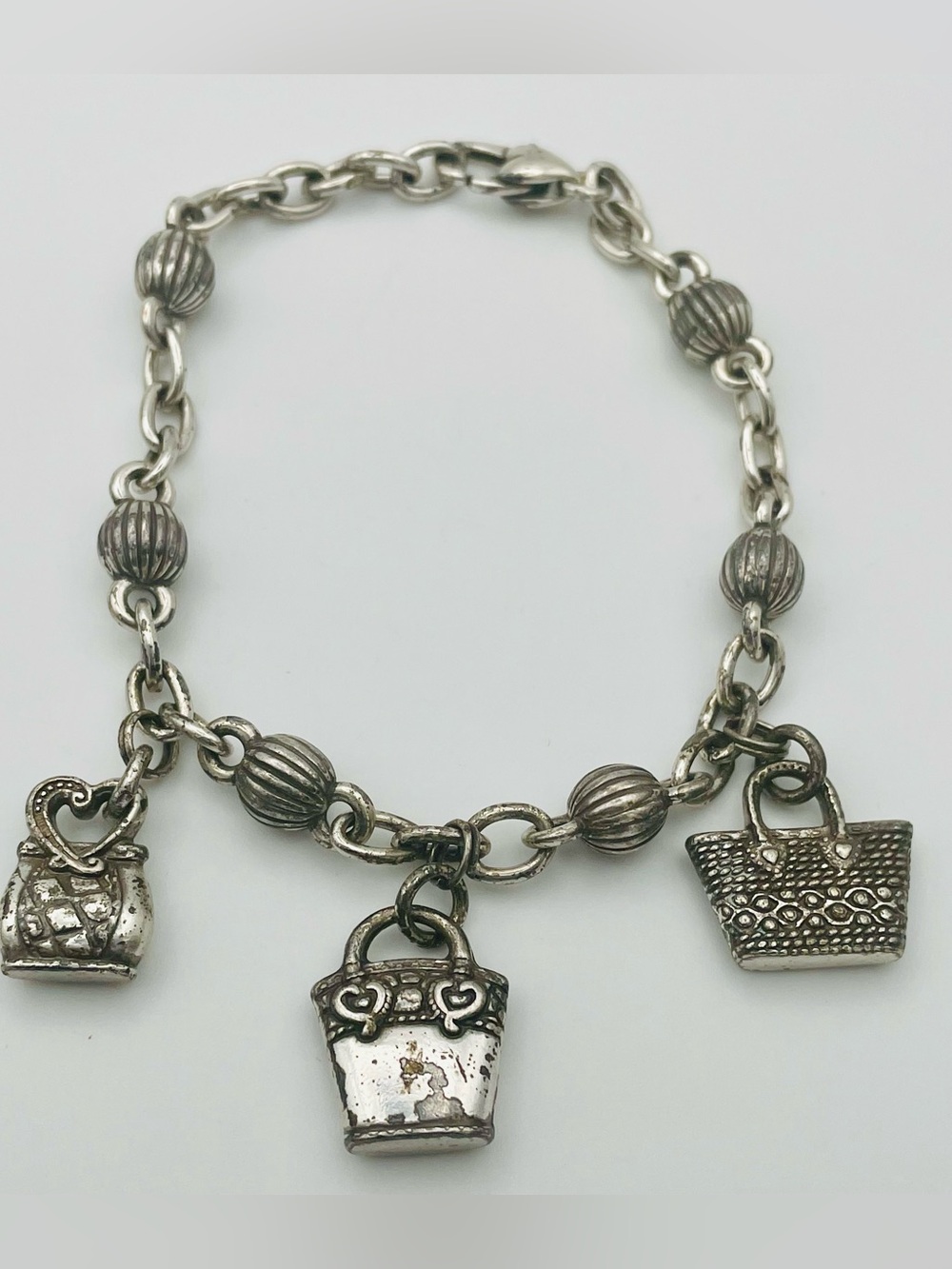 Vintage Brighton Silver Charm Bracelet with 3 Handbag Charms. 8 inches long